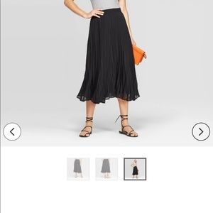 Black pleated midi skirt